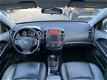 Kia Cee'd Sporty Wagon - 1.4 X-tra ISG *Airco-Leer - 1 - Thumbnail