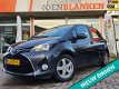 Toyota Yaris - 1.5 Hybrid Now BJ.2016 / 53.000 KM / Automaat / Navigatie / 5Drs / Zeer netjes - 1 - Thumbnail