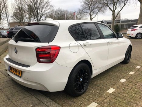 BMW 1-serie - 114i EDE Business Navigatie/Sportpakket/LM velgen - 1