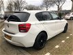 BMW 1-serie - 114i EDE Business Navigatie/Sportpakket/LM velgen - 1 - Thumbnail
