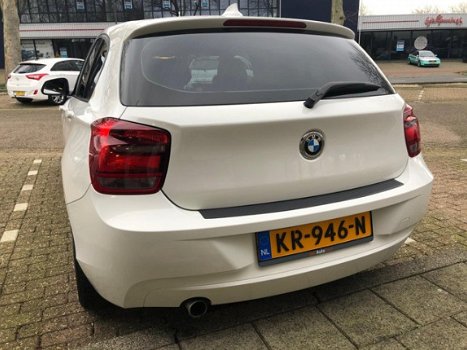 BMW 1-serie - 114i EDE Business Navigatie/Sportpakket/LM velgen - 1