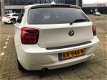 BMW 1-serie - 114i EDE Business Navigatie/Sportpakket/LM velgen - 1 - Thumbnail