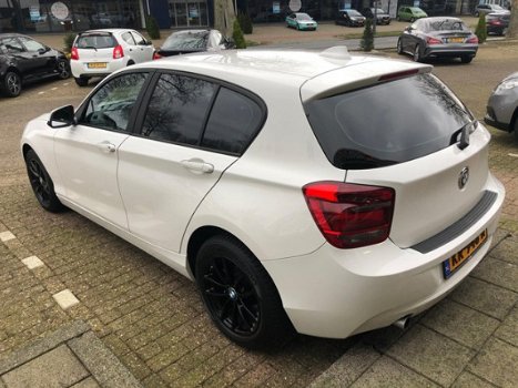 BMW 1-serie - 114i EDE Business Navigatie/Sportpakket/LM velgen - 1