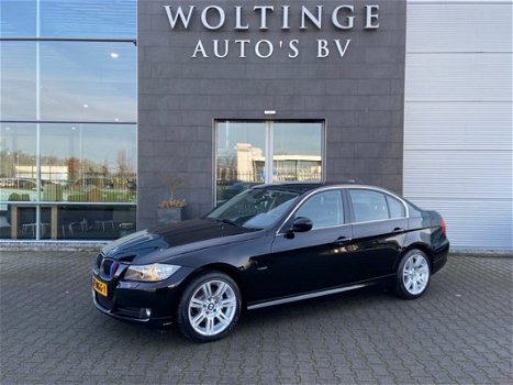 BMW 3-serie - 318i Business Line / Xenon / Navigatie Prof. / Leder - 1