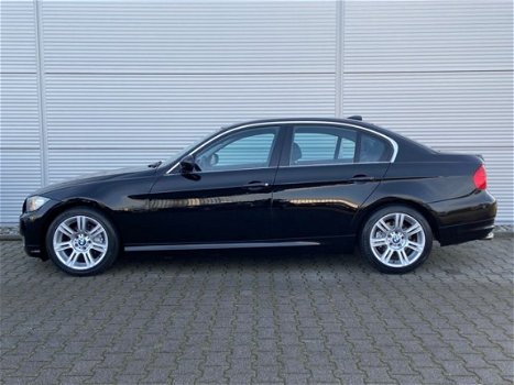 BMW 3-serie - 318i Business Line / Xenon / Navigatie Prof. / Leder - 1