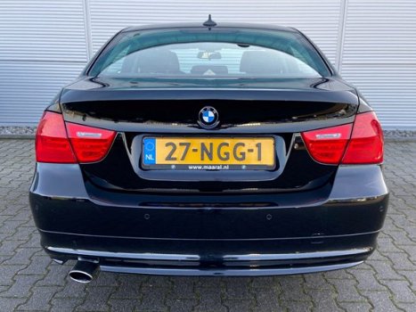 BMW 3-serie - 318i Business Line / Xenon / Navigatie Prof. / Leder - 1