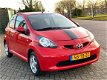 Toyota Aygo - 1.0-12V + l AIRCO l ELEK PAK l APK 01-2021 - 1 - Thumbnail