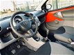 Toyota Aygo - 1.0-12V + l AIRCO l ELEK PAK l APK 01-2021 - 1 - Thumbnail
