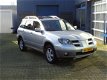 Mitsubishi Outlander Sport - 2.0 4WD 2003 grijs airco lm-velgen - 1 - Thumbnail