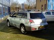 Mitsubishi Outlander Sport - 2.0 4WD 2003 grijs airco lm-velgen - 1 - Thumbnail