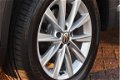 Volkswagen Tiguan - 1.4 TSI Sport&Style navigatie climate ctr pdc achter alcantaralmv 17 inch multif - 1 - Thumbnail