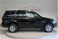 SsangYong Rexton - RX 270 Xdi s 2005/ NAP/ Automaat/ Navi/ Leder/ Trekhaak/ Clima/ Cruise/ Stoel ver - 1 - Thumbnail