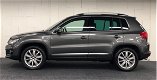 Volkswagen Tiguan - 2.0 TSI Sport&Style 4motion R-line Edition *Leder*Xenon*DsgAutomaat*Trekhaak - 1 - Thumbnail