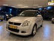 Suzuki Swift - 1.3 Exclusive 5Drs AIRCO/NAP/NIEUWE APK/ELEK.RAMEN - 1 - Thumbnail