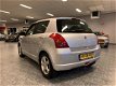 Suzuki Swift - 1.3 Exclusive 5Drs AIRCO/NAP/NIEUWE APK/ELEK.RAMEN - 1 - Thumbnail