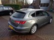 Seat Leon ST - 1.6 TDI Ecomotive Lease Sport LEER TREKHAAK STOEL VERWARMING - 1 - Thumbnail