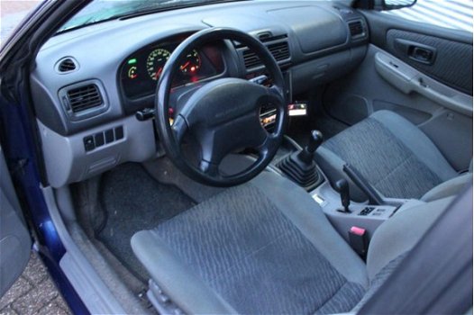 Subaru Impreza Plus - 2.0 GL AWD - 1