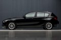 BMW 1-serie - 116i Luxury Sport (NAVIGATIE, LEER, CRUISE, XENON, SPORTSTOELEN, TELEFOON, LM VELGEN, - 1 - Thumbnail