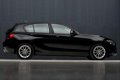 BMW 1-serie - 116i Luxury Sport (NAVIGATIE, LEER, CRUISE, XENON, SPORTSTOELEN, TELEFOON, LM VELGEN, - 1 - Thumbnail