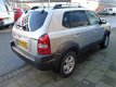 Hyundai Tucson - 2.0i Style Premium 1E eigenaar/Apk/Climate/Cruise/Leer/NAP/Boekjes/Velgen - 1 - Thumbnail