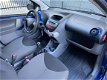 Toyota Aygo - 1.0-12V + NWE APK/Airco/Elekt.ramen/AUX/5-deurs - 1 - Thumbnail