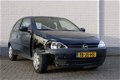 Opel Corsa - 1.2-16V Comfort - 1 - Thumbnail