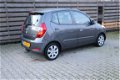 Hyundai i10 - 1.2 i-Motion Cool airco / afneembare trekhaak / 6 maand bovag garantie - 1 - Thumbnail