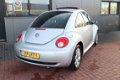 Volkswagen New Beetle - 2.0 Highline 85kw 116pk 48.000 km met NAP / Dealer onderhouden Elektr.schuif - 1 - Thumbnail