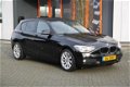 BMW 1-serie - 116I BUSINESS - Airco - Navi - Cruise - 17 Inch - 1 - Thumbnail