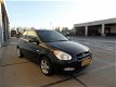 Hyundai Accent - 1.4i Dynamic - 1 - Thumbnail