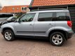 Skoda Yeti - 2.0 TDI Ambition 4x4 | Automaat | Climate Control | Trekhaak | Xenon - 1 - Thumbnail