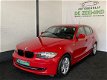 BMW 1-serie - 116i High Executive * ROOD* Nieuw apk - 1 - Thumbnail