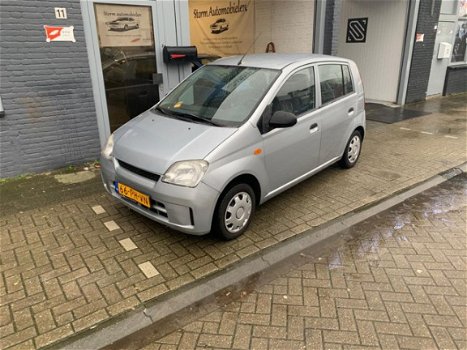 Daihatsu Cuore - 1.0-12V Nagano AUTOMAAT met onderhoudsboekjes, Airco, Cruise controle en een nieuwe - 1