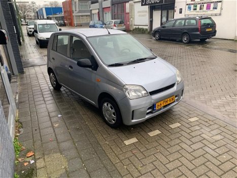 Daihatsu Cuore - 1.0-12V Nagano AUTOMAAT met onderhoudsboekjes, Airco, Cruise controle en een nieuwe - 1