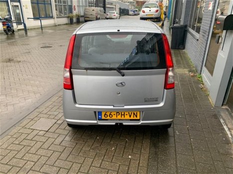 Daihatsu Cuore - 1.0-12V Nagano AUTOMAAT met onderhoudsboekjes, Airco, Cruise controle en een nieuwe - 1