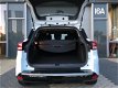 Renault Clio Estate - 0.9 TCe Limited Navi/Cruise/Airco/Bluetooth/Getinte ramen - 1 - Thumbnail