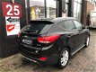 Hyundai ix35 - 2.0i 4WD i-Catcher 6/12 M Garantie - 1 - Thumbnail