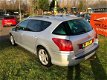 Peugeot 407 SW - 2.7 V6 HDiF Féline Aut, Leer - 1 - Thumbnail