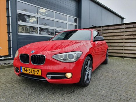 BMW 1-serie - 116i Business 5-deurs met Navigatie, Climate & Cruise control, Xenon, etc - 1