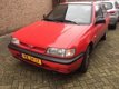 Nissan Sunny - 1.4 Clair stuurbekrachtiging-8 mnd APK - 1 - Thumbnail