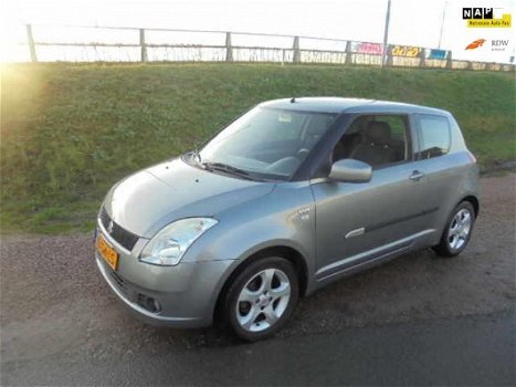 Suzuki Swift - 1.5 Exclusive swift 1.5 benzine airco lmv trekhaak - 1