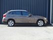 BMW X1 - 2.0i sDrive Automaat Chrome Line | Navi | afn. Trekhaak - 1 - Thumbnail