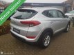 Hyundai Tucson - 1.6 GDi i-Drive, pdc, navi, 24 mnd garantie mogelijk - 1 - Thumbnail