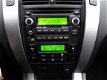 Hyundai Tucson - 2.0I CVVT STYLEVERSION 2WD - Clima - Cruise - Mp3 - Trekhaak - 1 - Thumbnail