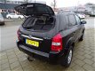 Hyundai Tucson - 2.0I CVVT STYLEVERSION 2WD - Clima - Cruise - Mp3 - Trekhaak - 1 - Thumbnail