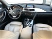 BMW 3-serie Touring - 330d High Executive ACC/PDC/BI-XENON/SPORT STOELEN/19 INCH - 1 - Thumbnail
