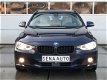 BMW 3-serie Touring - 330d High Executive ACC/PDC/BI-XENON/SPORT STOELEN/19 INCH - 1 - Thumbnail