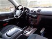 SsangYong Rexton - RX 270 Xdi Airco Automaat Zwart 175DKM NAP - 1 - Thumbnail