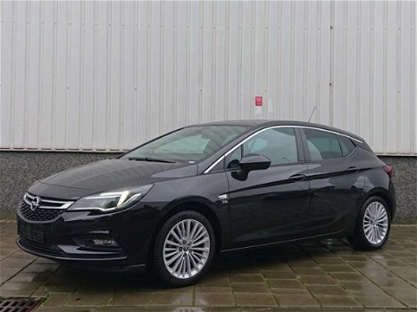 Opel Astra - 1.0 Turbo 120 Jaar Edition 105PK | AGR-Stoelen | Climate Control | Navi | Sensoren Voor - 1