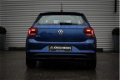 Volkswagen Polo - Comfortline 1.0 TSI 95pk Navigatie DAB Parkeersensoren Cruise control Climatronic - 1 - Thumbnail